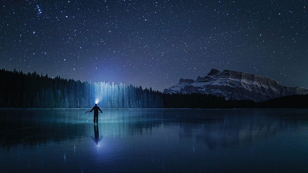 This Banff photographer captures stunning wild ice skating moments in the Rockies